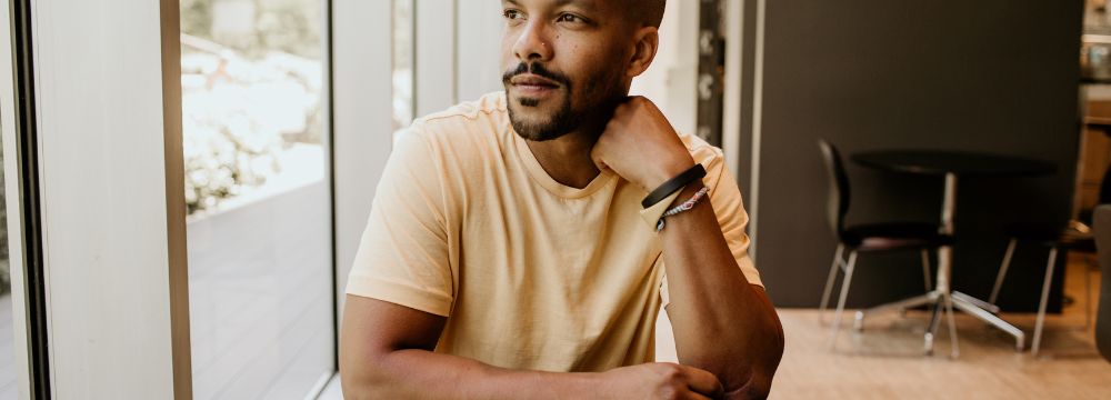 Younger man in coffee shop 